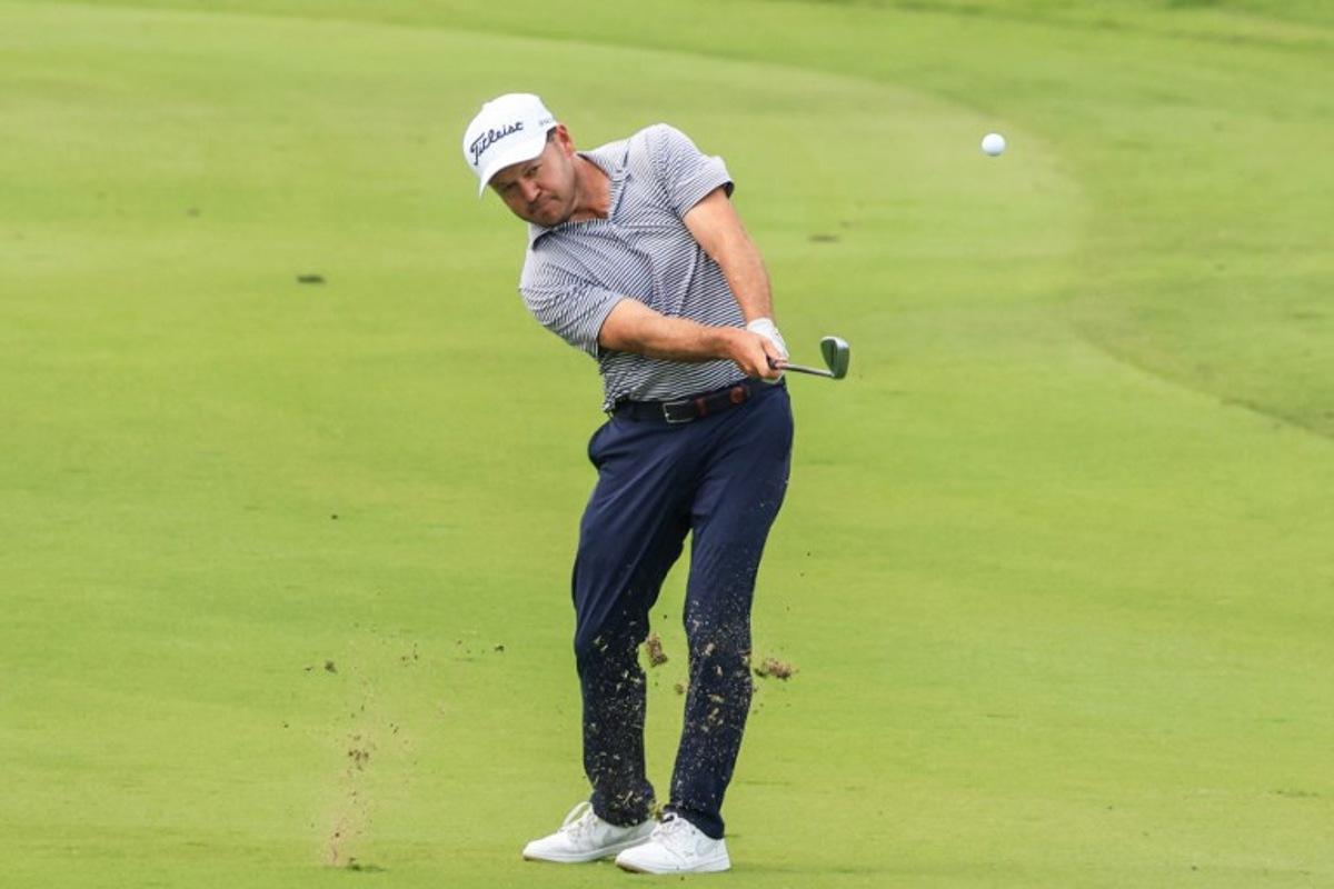 South Africa's Richard Sterne plays his shot on the 2nd hole during the third day of the Qatar Masters 2026 golf tournament at Doha Golf Club in Doha on February 7, 2026.  Karim JAAFAR / AFP