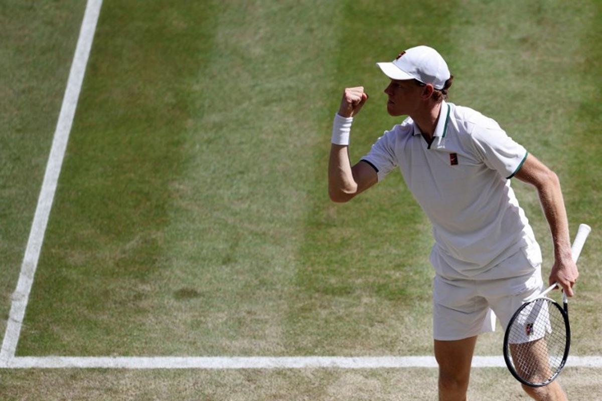 Italy's Jannik Sinner reacts as he plays against Germany's Jan-Lennard Struff during their men's singles quarter-final tennis match on the ninth day of the 2026 Wimbledon Championships at The All England Lawn Tennis and Croquet Club in Wimbledon, southwest London, on July 7, 2026.  Henry NICHOLLS / AFP
