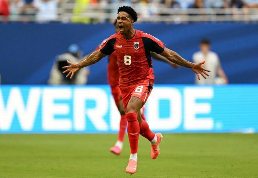 Cape Verde's midfielder #06 Kevin Pina celebrates after scoring his team's first goal during the 2026 World Cup Group H football match between Uruguay and Cape Verde at the Miami Stadium in Miami Gardens on June 21, 2026.   CHANDAN KHANNA / AFP