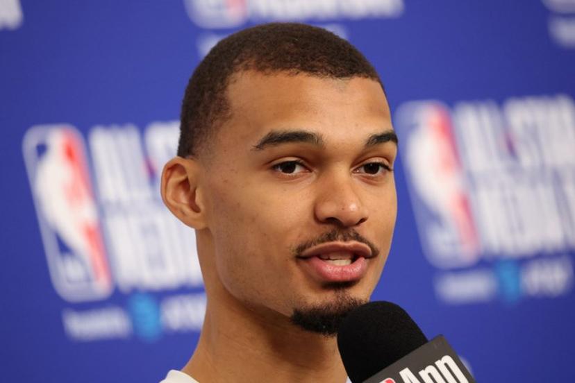 French basketball player Victor Wembanyama of the San Antonio Spurs speaks to the media during the NBA All-Star media day at the Intuit Dome in Inglewood, California, on February 14, 2026.  Patrick T. Fallon / AFP