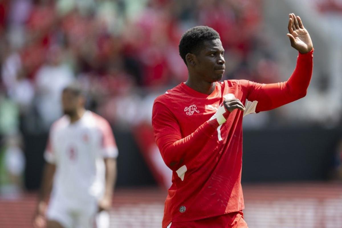 Switzerland's forward #7 Breel Embolo celebrates scoring his team's first goal during a friendly football match between Switzerland and Jordan ahead of the 2026 FIFA World Cup football tournament at the Kybunpark stadium in St. Gallen on May 31, 2026.  Ennio LEANZA / AFP