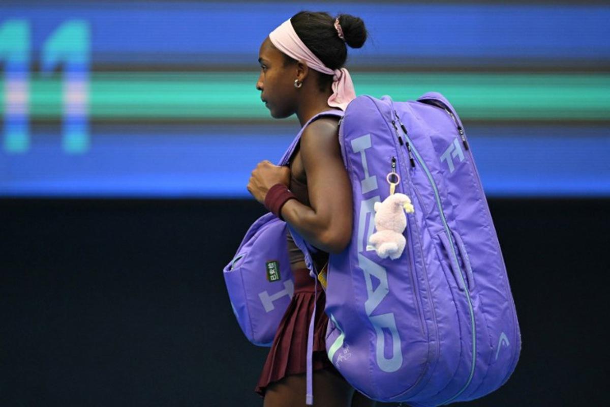USA's Coco Gauff leaves the court after losing her women's singles match against Belgium's Elise Mertens at the China Open tennis tournament in Beijing on October 7, 2026.   Adek BERRY / AFP