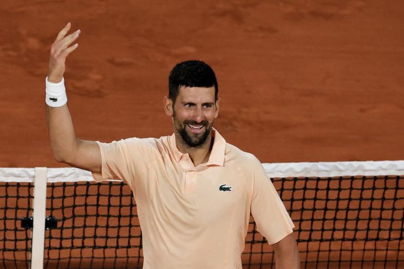 Serbia's Novak Djokovic celebrates after winning the second set as he plays against France's Giovanni Mpetshi Perricard during their men's singles match on day 1 of the French Open tennis tournament on Court Philippe-Chatrier at the Roland-Garros Complex in Paris on May 24, 2026.  Thomas SAMSON / AFP
