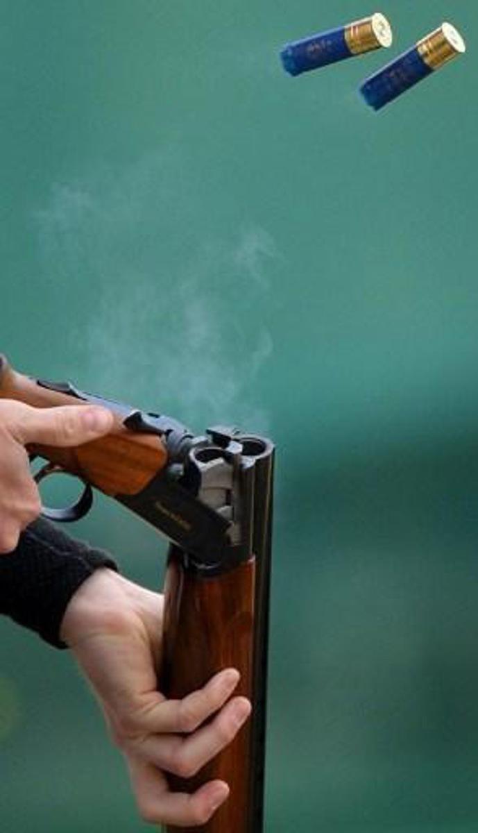Denmark's Anders Golding ejects used cartridges during the men's skeet qualifying at the ISSF World Cup London shooting competition, part of the London Prepares series of test events, at the Royal Artillery Barracks in London on April 19, 2012. AFP PHOTO/BEN STANSALL