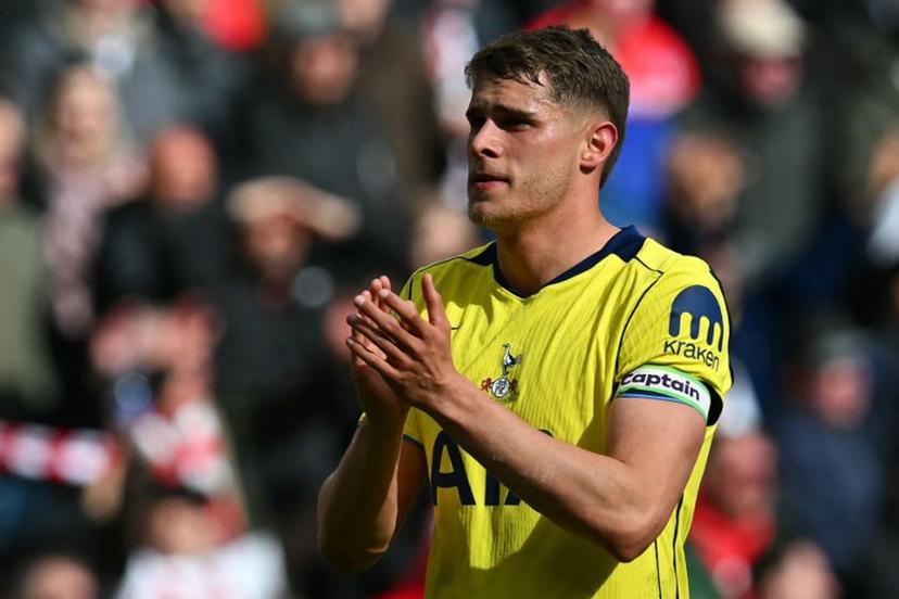 Tottenham Hotspur's Dutch defender #37 Micky van de Ven applauds fans on the pitch after the English Premier League football match between Sunderland and Tottenham Hotspur at The Stadium of Light in Sunderland in north east England on April 12, 2026. Sunderland won the game 1-0. ANDY BUCHANAN / AFP