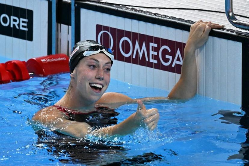US' swimmer Gretchen Walsh celebrates winning the final of the women's 50m butterfly swimming event during the 2025 World Aquatics Championships in Singapore on August 2, 2025.  Oli SCARFF / AFP