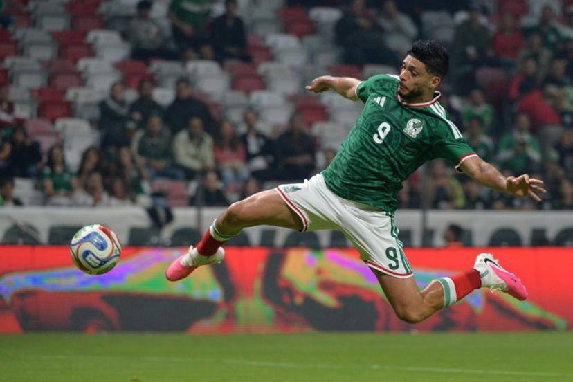 Mexico's forward #09 Raul Jimenez jumps for the ball during the international friendly football match between Mexico and Serbia at the Nemesio Diez Stadium in Toluca, Mexico on June 4, 2026.  Mario Vazquez / AFP