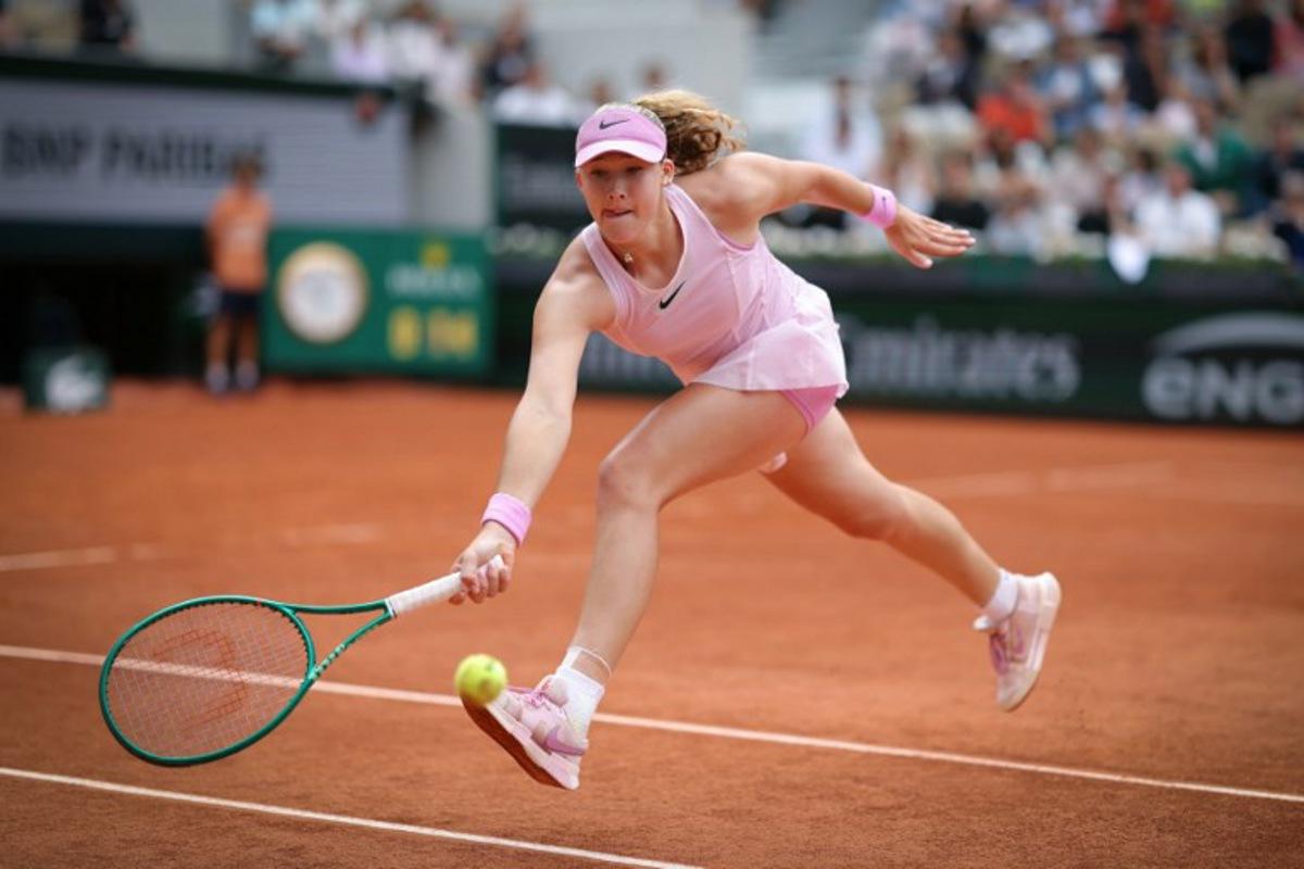 Mirra Andreeva plays a forehand return to Switzerland's Jil Teichmann during their women's singles match on day 8 of the French Open tennis tournament on Court Suzanne-Lenglen at the Roland-Garros Complex in Paris on May 31, 2026.  Thomas SAMSON / AFP