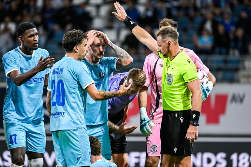 Gent's Josue Vergara and Gent's Siebe Van der Heyden and referee Pawel Raczkowski pictured during a soccer game between Belgian KAA Gent and Scottish Hibernian FC, Thursday 20 August 2026 in Gent, the first leg of the play-off round for the UEFA Conference League group phase. BELGA PHOTO TOM GOYVAERTS