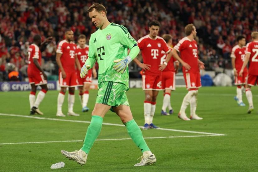 Bayern Munich's German goalkeeper #01 Manuel Neuer kicks a watr bottle off the pitch during the UEFA Champions League second-leg, semi-final football match between FC Bayern Munich and Paris Saint-Germain (PSG) in Munich, southern Germany on May 6, 2026.  Odd ANDERSEN / AFP