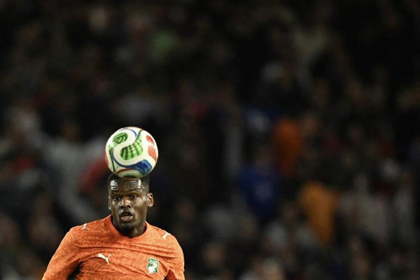 Ivory Coast's forward #09 Ange-Yoan Bonny eyes the ball during the international friendly football match between France and Ivory Coast ahead of the 2026 FIFA World Cup football tournament at the Stade de la Beaujoire in Nantes, western France, on June 4, 2026.  Loic VENANCE / AFP