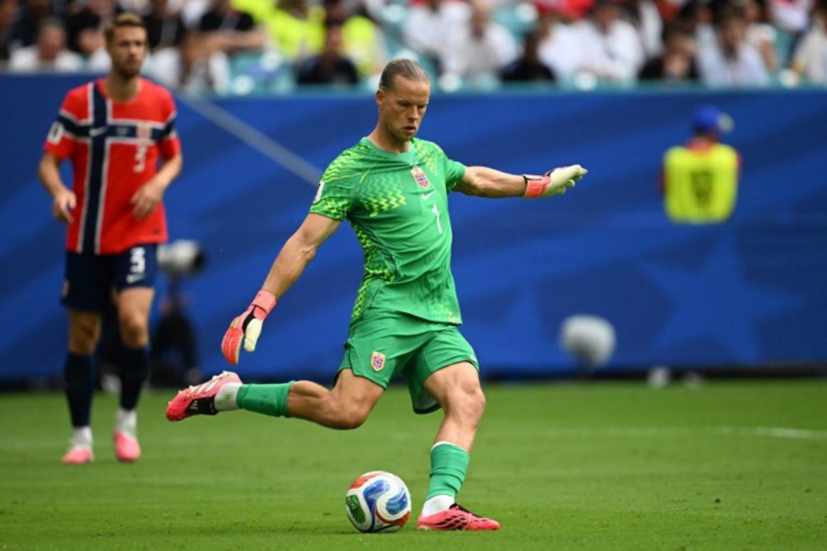 Norway's goalkeeper #01 Orjan Nyland kicks the ball during the 2026 World Cup football tournament quarter-final match between Norway and England at Miami Stadium in Miami Gardens on July 11, 2026.   MAURO PIMENTEL / AFP