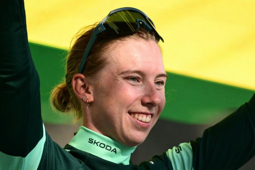 Team SD Worx-Protime's Dutch rider Lorena Wiebes celebrates on the podium with the best sprinter's green jersey after the individual time-trial in the 4th (out of 9) stage of the fifth edition of the Women's Tour de France cycling race, 21 km time trial between Gevrey-Chambertin and Dijon, in Dijon, eastern France on August 4, 2026.  NICOLAS TUCAT / AFP