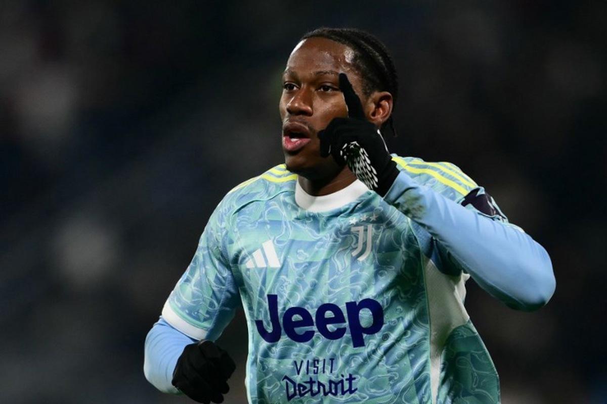 Juventus' Canadian forward #30 Jonathan David celebrates scoring his team's third goal during the Italian Serie A football match between Sassuolo and Juventus at the Mapei - Città del Tricolore stadium in Reggio Emilia, on January 6, 2026.  Marco BERTORELLO / AFP