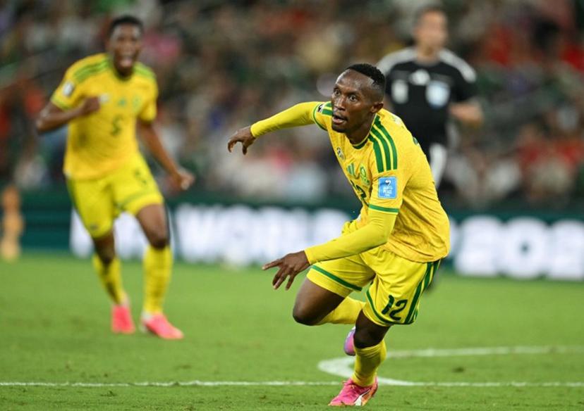 South Africa's forward #12 Thapelo Maseko celebrates scoring his team's first goal during the 2026 World Cup Group A football match between South Africa and South Korea at the Monterrey Stadium in Guadalupe, Mexico, on June 24, 2026.   Yuri CORTEZ / AFP