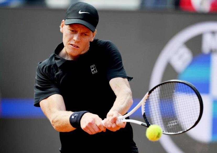 Italy's Jannik Sinner hits a return to Italy's Andrea Pellegrino during the ATP Rome Open tennis tournament at Foro Italico in Rome on May 12, 2026.   Tiziana FABI / AFP