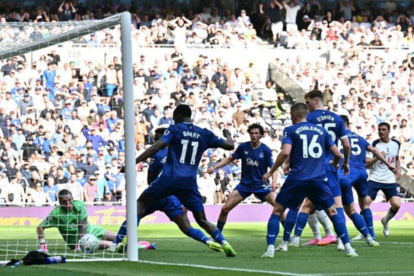 Tottenham Hotspur's Portugese midfielder #06 Joao Palhinha (R) sees his shot cross the West Ham goal-line for the opening goal of the English Premier League football match between Tottenham Hotspur and Everton at the Tottenham Hotspur Stadium in London, on May 24, 2026.  Ben STANSALL / AFP
