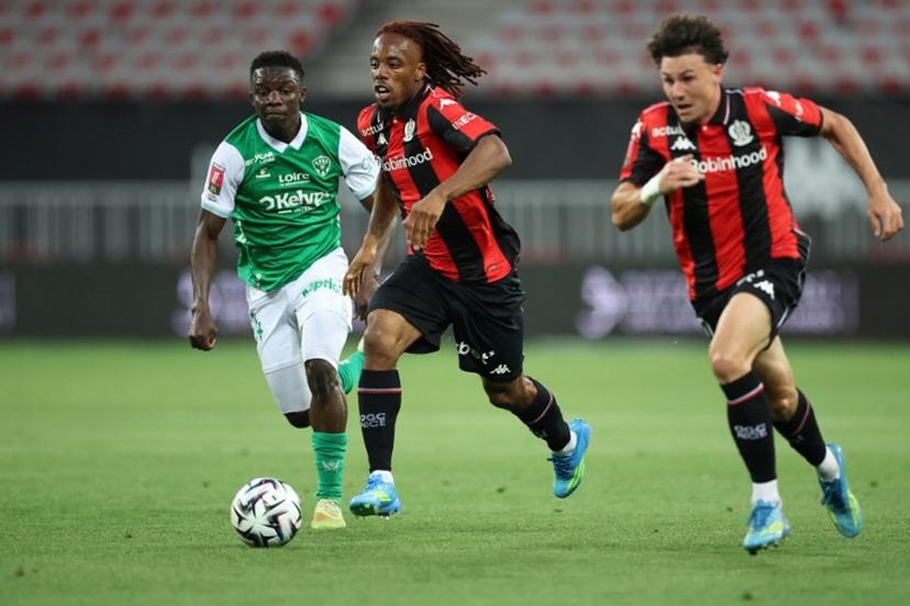Nice's French forward #11 Elye Wahi (C) runs with de ball during the L1-L2 playoff second-leg football match between first divison club OGC Nice and second division club AS Saint-Etienne at the Allianz Riviera Stadium in Nice, south-eastern France, on May 29, 2026.  Valery HACHE / AFP