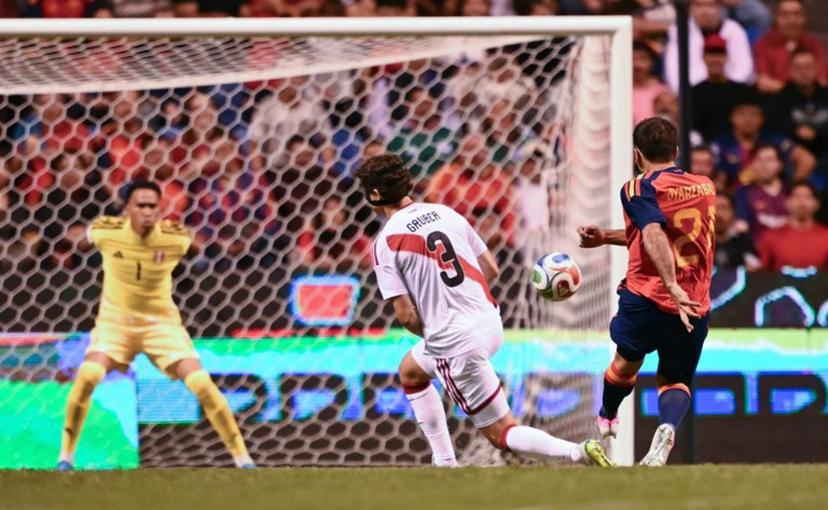 Spain's forward #21 Mikel Oyarzabal scores his team's first goal during the international friendly football match between Peru and Spain at Cuauhtemoc Stadium in Puebla, Mexico, on June 8, 2026.  CARL DE SOUZA / AFP