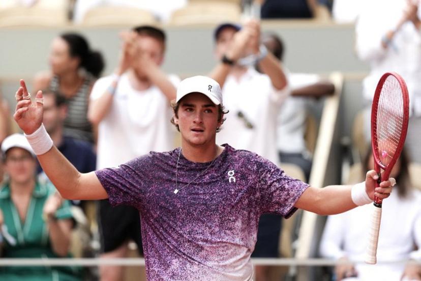 Brazil's Joao Fonseca reacts after winning a game as he plays against Serbia's Novak Djokovic during their men's singles match on day 6 of the French Open tennis tournament on Court Philippe-Chatrier at the Roland-Garros Complex in Paris on May 29, 2026.  Dimitar DILKOFF / AFP