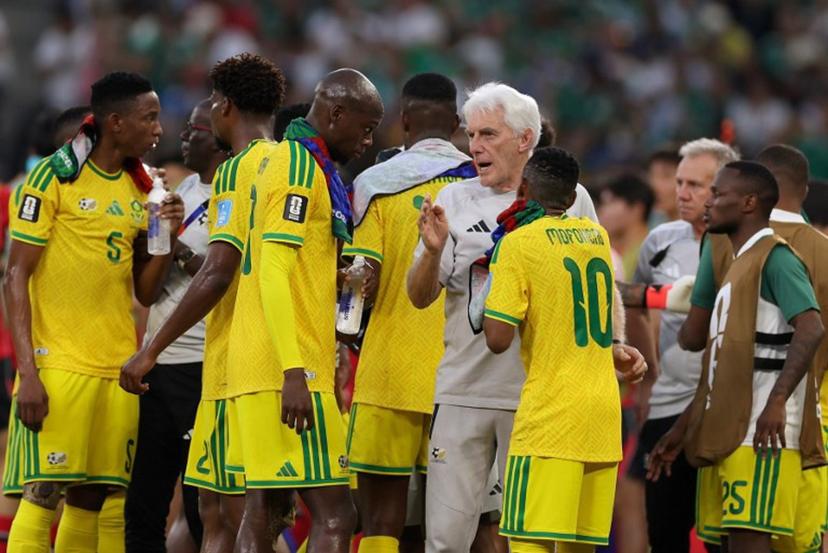 South Africa's Belgian head coach Hugo Broos talks to his players  during a hydration break of the 2026 World Cup Group A football match between South Africa and South Korea at the Monterrey Stadium in Guadalupe, Mexico, on June 24, 2026.   Julio Cesar AGUILAR / AFP