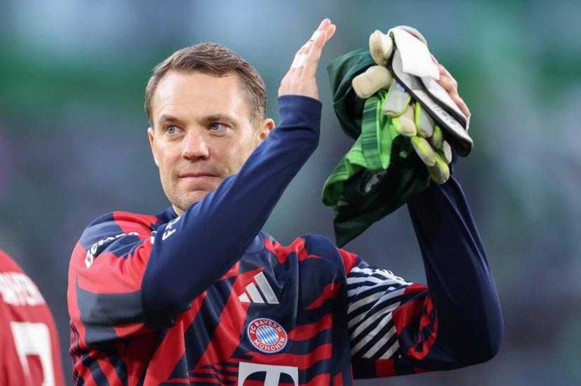 (FILES) Bayern Munich's German goalkeeper #01 Manuel Neuer acknowledges the fans after the German first division Bundesliga football match between VfL Wolfsburg and FC Bayern Munich in Wolfsburg, on May 9, 2026. Bayern Munich veteran Manuel Neuer announced on May 15, 2026 that he has extended his contract at the German champions by one year until 2027. The 40-year-old goalkeeper's deal was set to expire in the summer but he will stay on in Munich for what will be a 16th year at the Bavarian giants.  Ronny HARTMANN / AFP