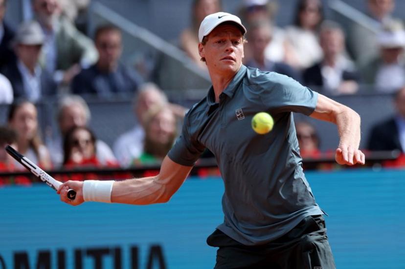 Italy's Jannik Sinner returns a ball to Germany's Alexander Zverev during the 2026 ATP Tour Madrid Open tennis tournament final singles match at the Caja Magica in Madrid, on May 3, 2026.  Thomas COEX / AFP