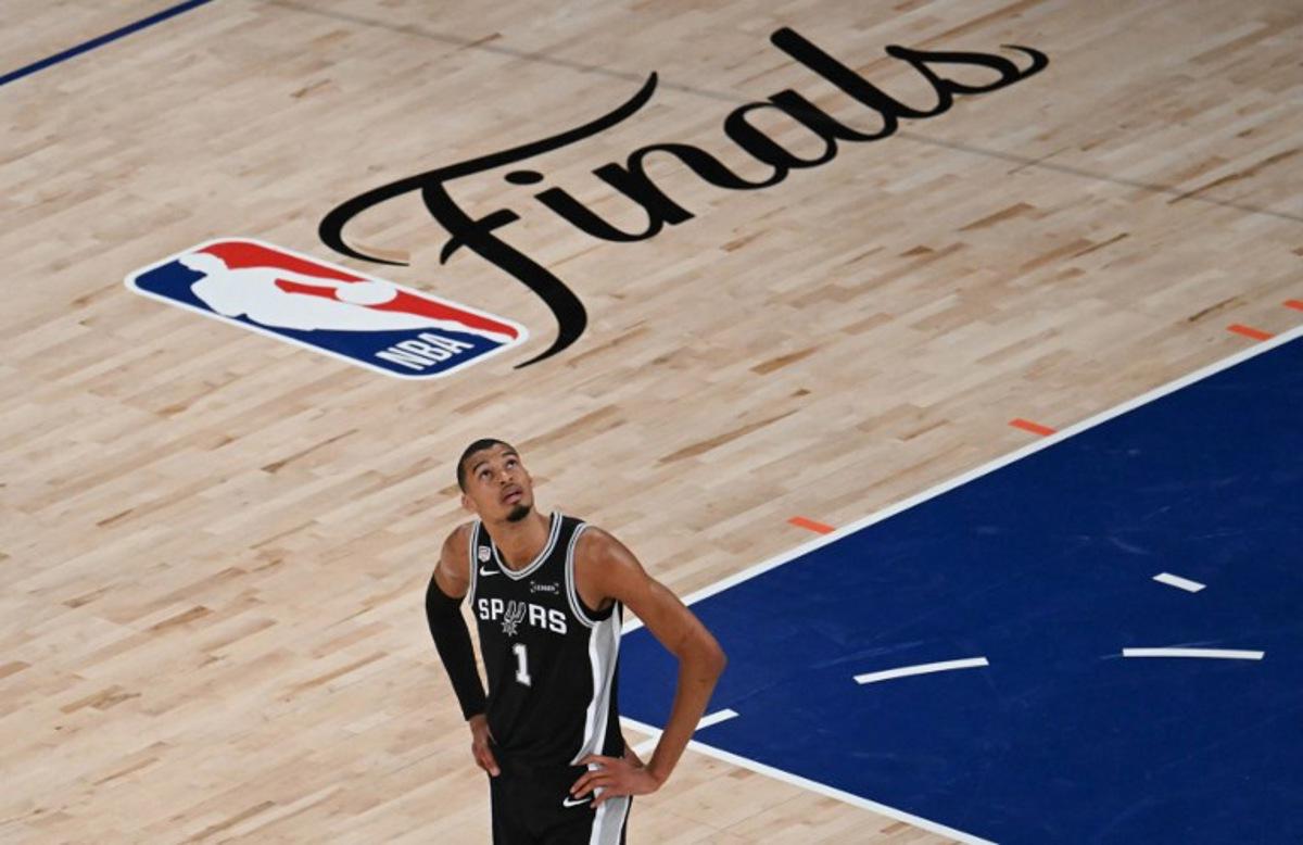 San Antonio Spurs' French forward-center #01 Victor Wembanyama looks up during Game Three of the NBA Finals between the San Antonio Spurs and the New York Knicks at Madison Square Garden in New York on June 8, 2026.  SAUL LOEB / AFP