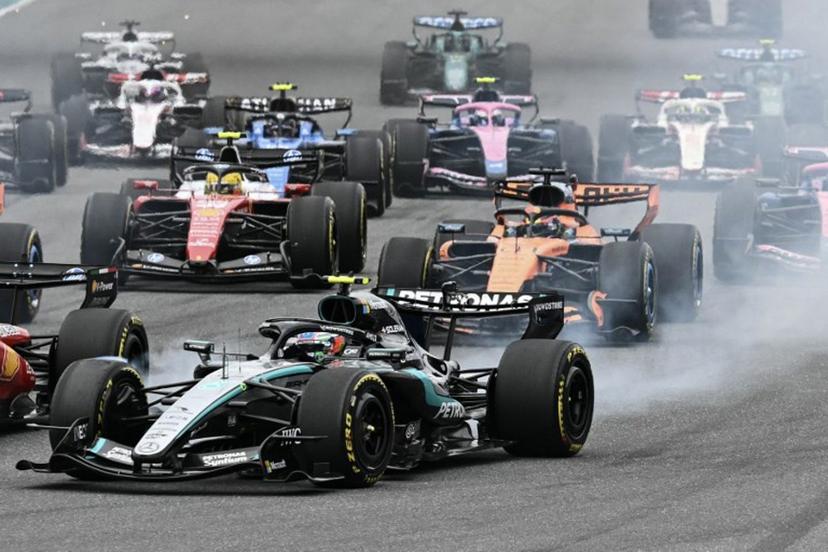 Mercedes' Italian driver Kimi Antonelli (L) races during the 2026 Miami Formula One Grand Prix at Miami International Autodrome in Miami Gardens, Florida, on May 3, 2026.   CHANDAN KHANNA / AFP