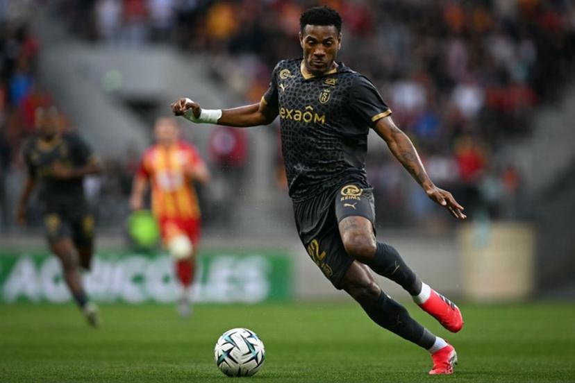 Stade de Reims' Cameroonian defender #22 Samuel Kotto controls the ball during the French L2 football match between Le Mans and Stade de Reims at the stade Marie-Marvingt in Le Mans, north-western France, on May 2, 2026.  Lou BENOIST / AFP