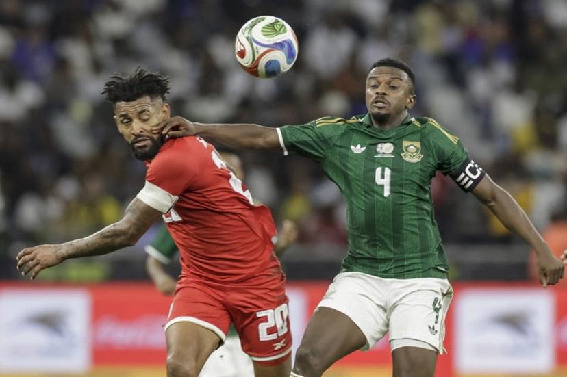 Panama's midfielder #20 Anibal Godoy fights for the ball with South Africa's midfielder #4 Teboho Mokoena during the friendly international football match between South Africa and Panama at the Cape Town Stadium in Cape Town on March 31, 2026.  GIANLUIGI GUERCIA / AFP