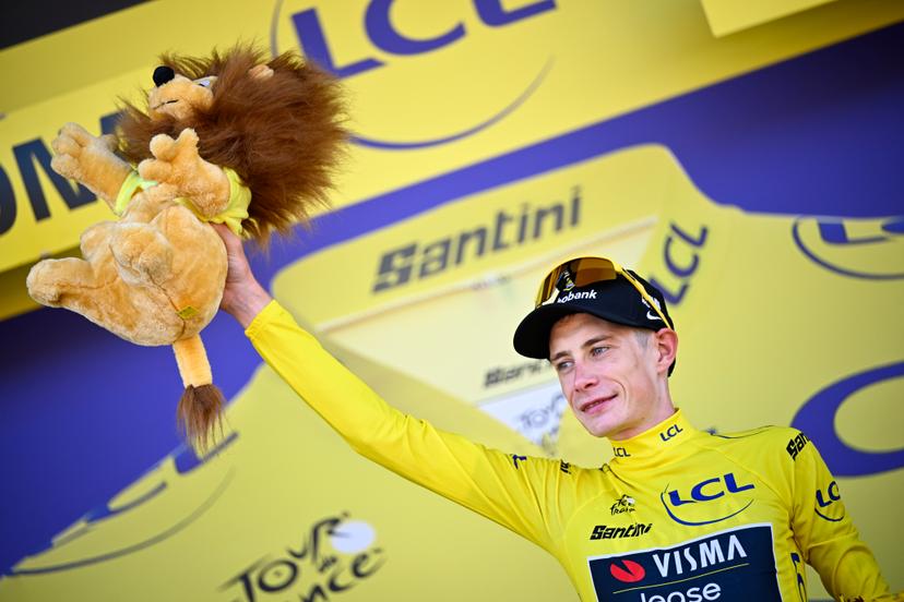 Danish Jonas Vingegaard of Team Visma-Lease a Bike celebrates on the podium in the yellow jersey of leader in the overall ranking after the first stage of the 2026 Tour de France cycling race, a team time trial of 19km with start and finish in Barcelona, Spain, Saturday 04 July 2026. The 113th edition of the Tour de France starts on Saturday 4 July in Barcelona, Spain, and will finish in Paris, France on the 26th of July.  BELGA PHOTO JASPER JACOBS