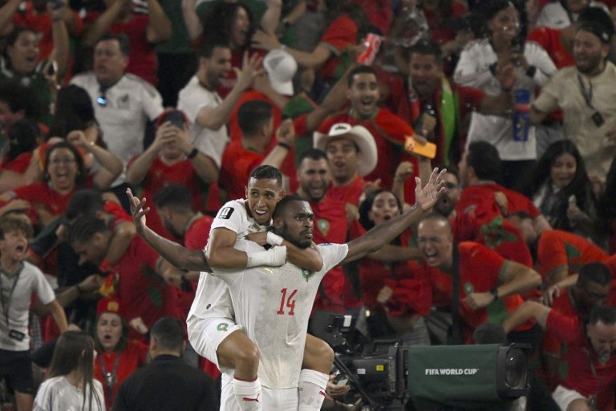 Morocco's defender #14 Issa Diop (R) celebrates scoring his team's first goal with forward #09 Soufiane Rahimi during the 2026 World Cup round of 32 football match between the Netherlands and Morocco at the Monterrey Stadium in Guadalupe on June 29, 2026.   Alfredo ESTRELLA / AFP