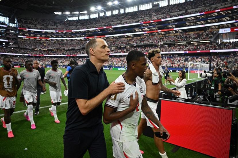 England's German head coach Thomas Tuchel (L) reacts with England's defender #02 Ezri Konsa after winning the  2026 World Cup Group L football match between England and Croatia at the Dallas Stadium in Arlington on June 17, 2026.   Paul ELLIS / AFP