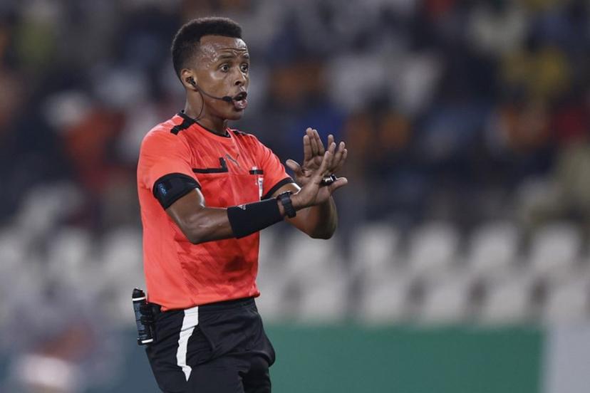 (FILES) Somalian referee Omar Abdulkadir Artan gestures during the Africa Cup of Nations (CAN) 2024 group D football match between Mauritania and Algeria at Stade de la Paix in Bouake on January 23, 2024. Award-winning Somali referee Omar Artan, set to be the first from his country to officiate at the World Cup, was denied entry to the United States, a sports ministry official told AFP on June 8, 2026.  "Denying him entry to the United States and preventing him from officiating scheduled matches harms not only him personally but also undermines football's commitment to fairness, merit, and the spirit of fair play," Ciise Aden Abshir, a senior advisor to Somalia's Ministry of Youth and Sports and a former national team captain, told AFP.  KENZO TRIBOUILLARD / AFP