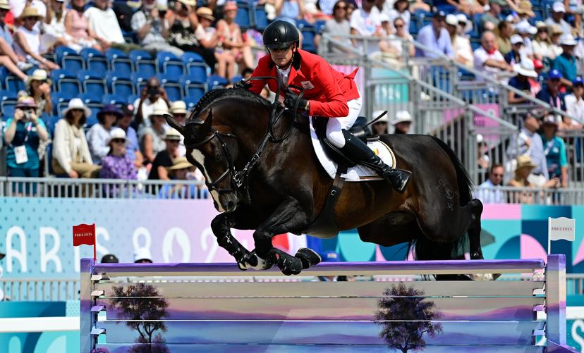 Belgian rider Jerome Guery with horse Quel Homme de Hus pictured in action during the Equestrian Jumping Team final at the Paris 2024 Olympic Games, on Friday 02 August 2024 in Paris, France. The Games of the XXXIII Olympiad are taking place in Paris from 26 July to 11 August. The Belgian delegation counts 165 athletes competing in 21 sports. BELGA PHOTO DIRK WAEM