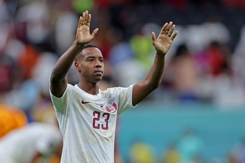 Qatar's midfielder #23 Assim Madibo reacts after the Qatar 2022 World Cup Group A football match between the Netherlands and Qatar at the Al-Bayt Stadium in Al Khor, north of Doha on November 29, 2022.  Giuseppe CACACE / AFP
