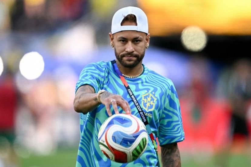 Brazil's forward #10 Neymar gestures during a warm up ahead of the 2026 World Cup Group C football match between Brazil and Morocco at the New York/New Jersey Stadium in East Rutherford on June 13, 2026.  Mauro PIMENTEL / AFP