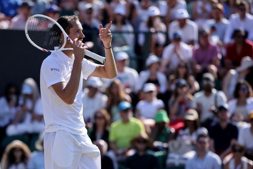 Russia's Daniil Medvedev reacts against Germany's Jan-Lennard Struff during their men's singles third round tennis match on the fifth day of the 2026 Wimbledon Championships at The All England Lawn Tennis and Croquet Club in Wimbledon, southwest London, on July 3, 2026.  Henry NICHOLLS / AFP