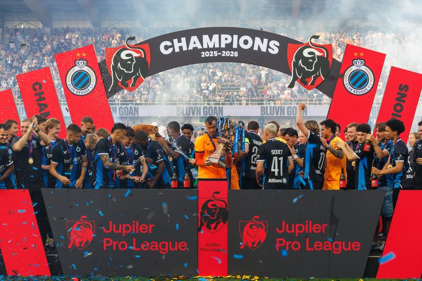 Club's players celebrate on the podium after winning a game between Belgian soccer team Club Brugge KV and KAA Gent, Sunday 24 May 2026 in Brugge, on the last day of the Champion's Play-offs of the 2025-2026 'Jupiler Pro League' first division of the Belgian championship. BELGA PHOTO KURT DESPLENTER
