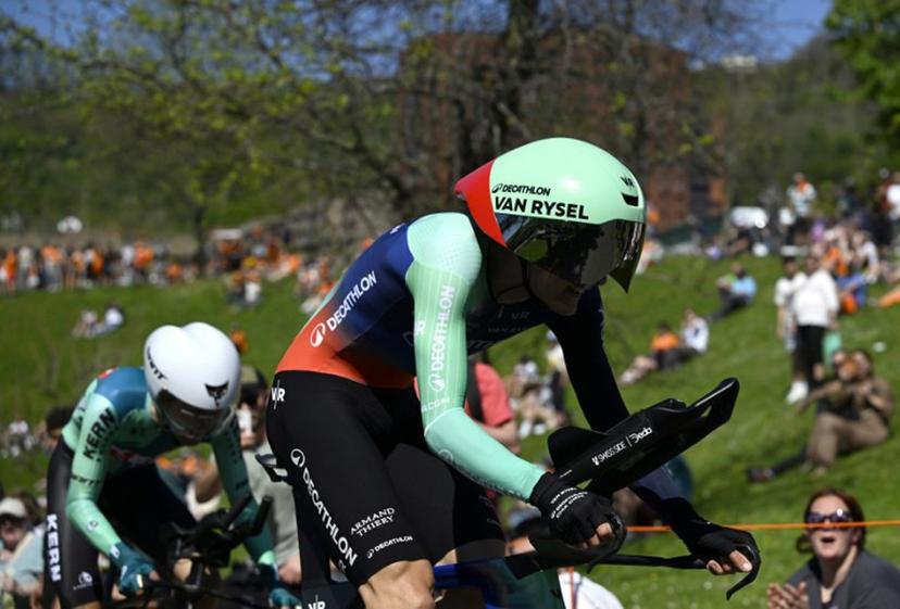 Team Decathlon CMA CGM's French rider Paul Seixas (R) competes ahead of team Decathlon CMA CGM's US rider Matthew Riccitello in the first stage of the Basque Country's Itzulia cycling tour, a 13.8 km time trial in Bilbao on April 6, 2026.   ANDER GILLENEA / AFP