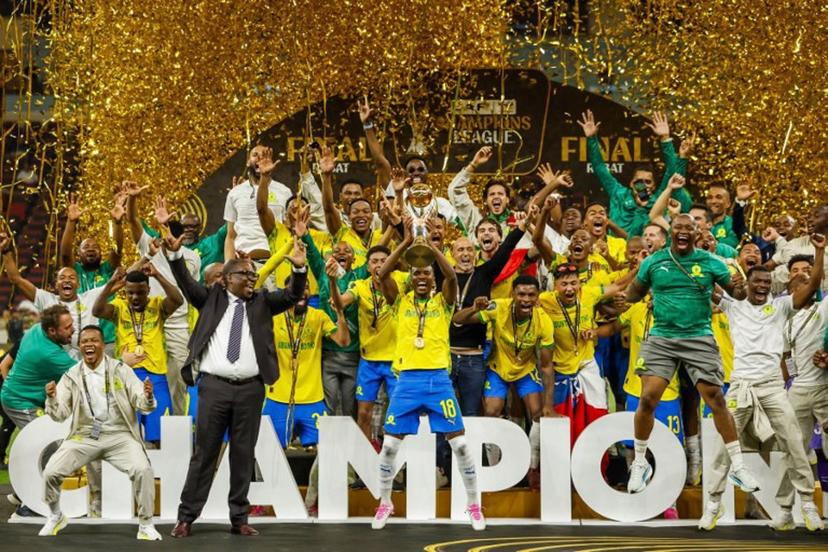 Mamelodi Sundowns' players celebrate with their victory at the end of the CAF Champions League final football match between Mamelodi Sundowns and AS FAR at the Prince Moulay Abdellah Stadium in Rabat on May 24, 2026.  Abdel Majid BZIOUAT / AFP