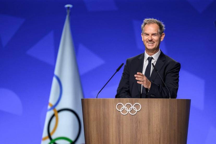 President of the Organizing Committee for the Alpes 2030 Winter Olympics Edgar Grospiron speaks during an extraordinary session of the International Olympic Committee (IOC) in Lausanne on June 25, 2026. The roughly 100 members of IOC approved on June 25, 2026 the re-inclusion of ski mountaineering in the program for the Alpes 2030 Olympic Winter Games, which will take place in the French Alps, after the "additional sport" made its Olympic debut at Milan-Cortina in 2026. Fabrice COFFRINI / AFP