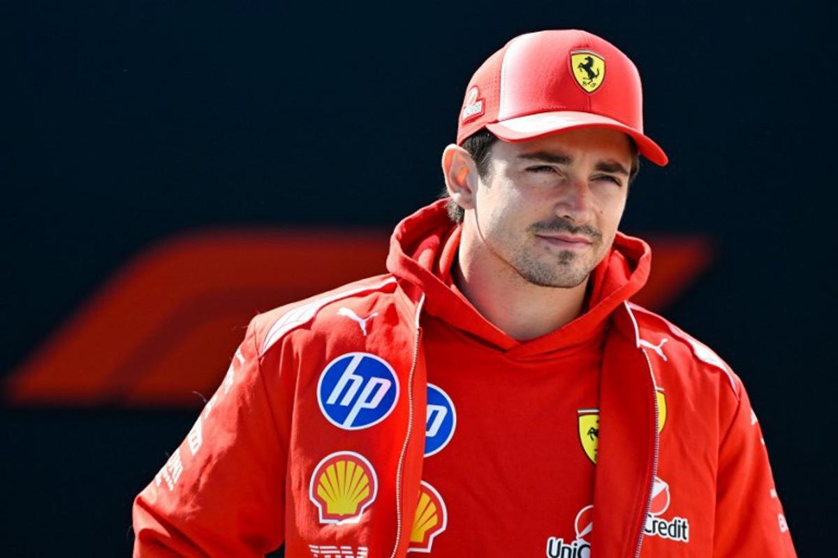 Ferrari's Monegasque driver Charles Leclerc arrives ahead of a practice session for the 2026 Formula 1 Grand Prix du Canada at Circuit Gilles-Villeneuve in Montreal, Canada, on May 22, 2026.   Andrej Ivanov / AFP