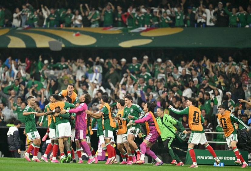 Mexico players celebrate after forward #16 Julian Quinones (unseen) scores his team's first goal during the 2026 World Cup round of 32 football match between Mexico and Ecuador at the Mexico City Stadium in Mexico City on June 30, 2026.   Yuri CORTEZ / AFP