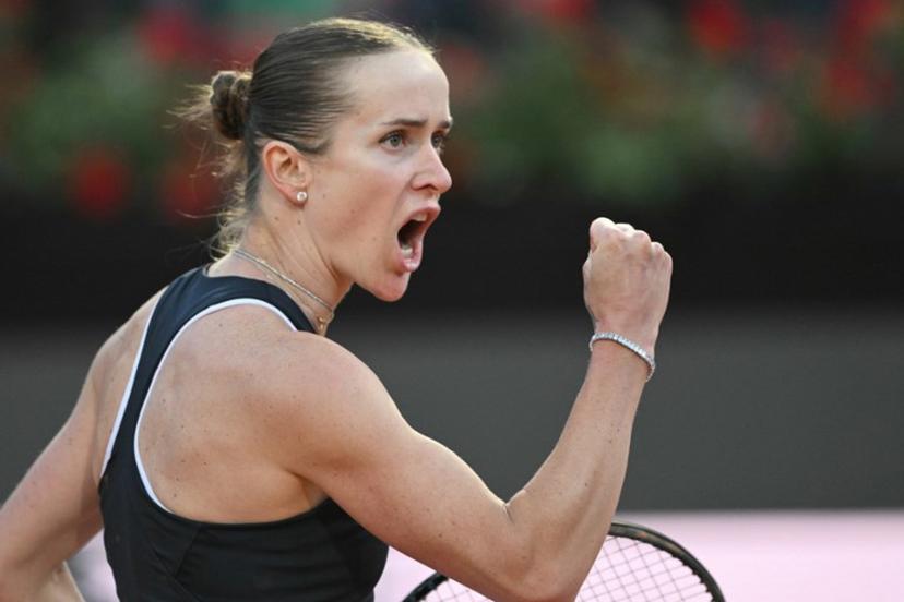 Ukraine's Elina Svitolina celebrates a point against USA's Coco Gauff during the WTA Rome Open tennis tournament final at Foro Italico in Rome on May 16, 2026.   Tiziana FABI / AFP