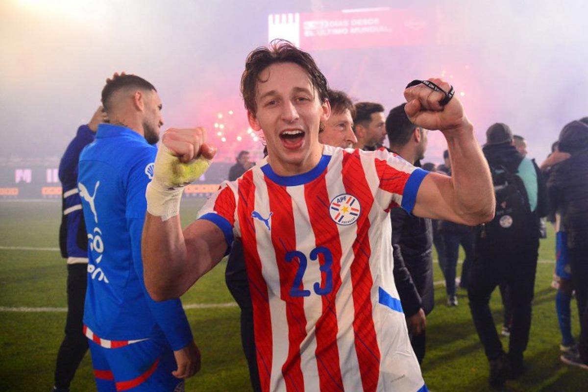 Paraguay's midfielder #23 Matias Galarza celebrates after the 2026 FIFA World Cup South American qualifiers football match between Paraguay and Ecuador at the Defensores del Chaco stadium in Asuncion on September 4, 2025.   Daniel DUARTE / AFP