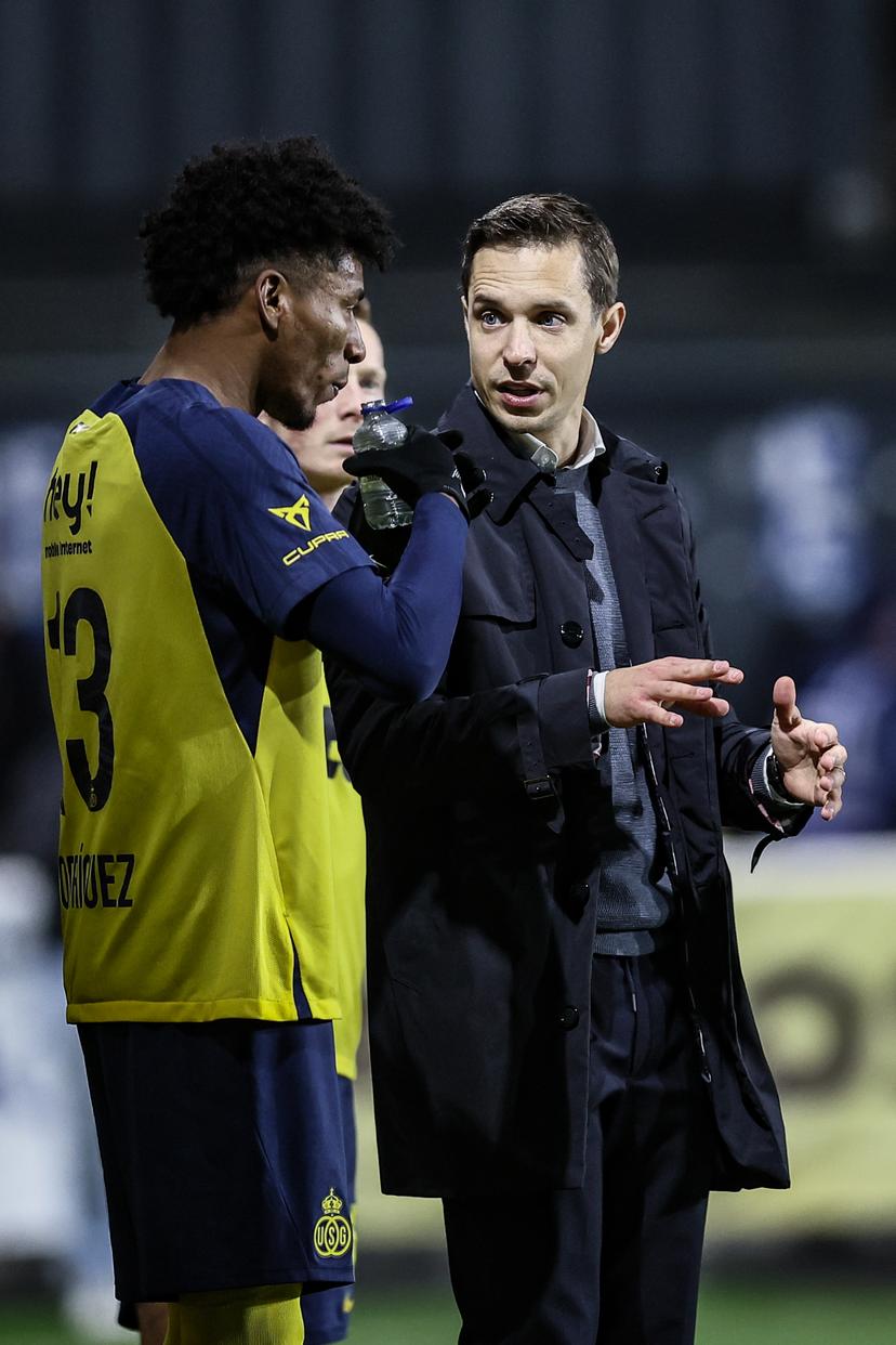 Union's Kevin Rodriguez and Union's head coach David Hubert pictured during a soccer match between Royale Union Saint-Gilloise and Zulte Waregem, Saturday 20 December 2025 in Brussels, on day 19 of the 2025-2026 'Jupiler Pro League' first division of the Belgian championship. BELGA PHOTO BRUNO FAHY