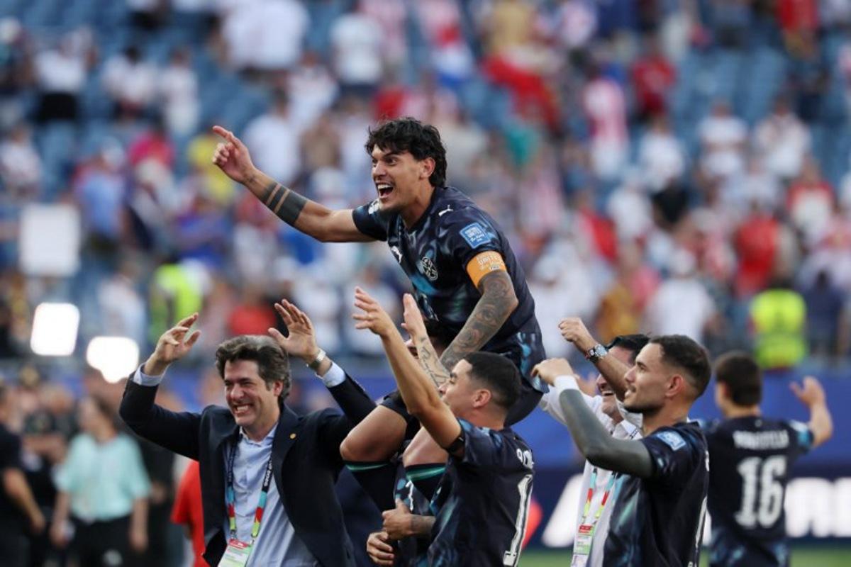 Paraguay's defender #15 Gustavo Gomez (C) and teammates celebrate after winning the penalty shootout of the 2026 World Cup round of 32 football match between Germany and Paraguay at the Boston Stadium in Foxborough on June 29, 2026.   Odd ANDERSEN / AFP