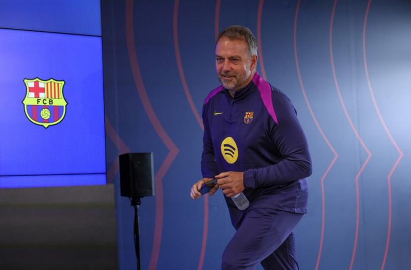Barcelona's German coach Hans-Dieter Flick arrives to give a press conference on the eve of the Spanish league football match between FC Barcelona and Real Madrid CF at Camp Nou Stadium in Barcelona on May 9, 2026.  Lluis GENE / AFP